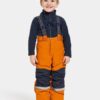 Didriksons pašiltintos neperšlampamos kelnės IDRE KIDS PANTS 6 su augimo funkcija - Orange Jam